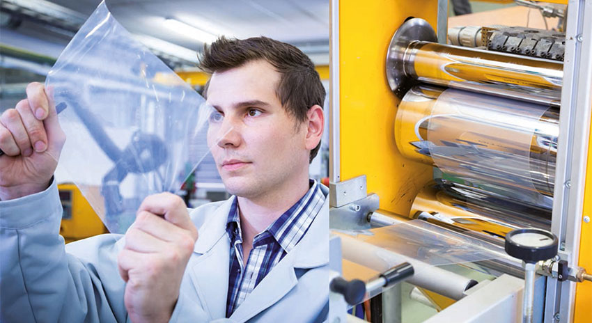 Polymer Competence Center Leoben GmbH Employee holding and examining product.