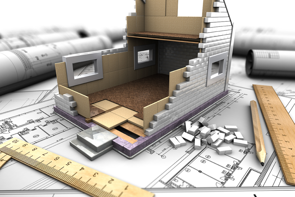 3-D Modellhaus im Bau auf einer Skizze mit Lineal