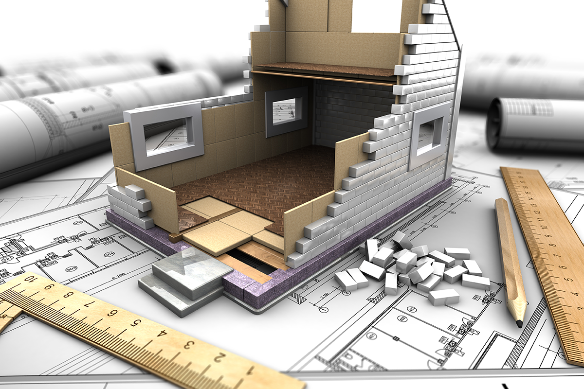 3D model house under construction on a sketch with a ruler